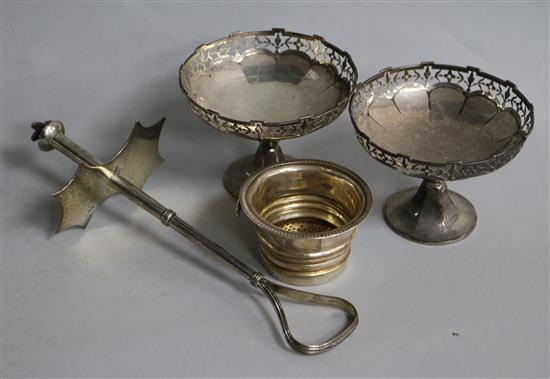 A pair of silver pedestal bonbon dishes, the straining section of a Georgian silver wine funnel & a silver handle.